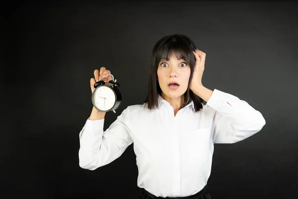 Businesswoman Standing Black Background Holding Vintage Alarm Clock — Stock Photo, Image