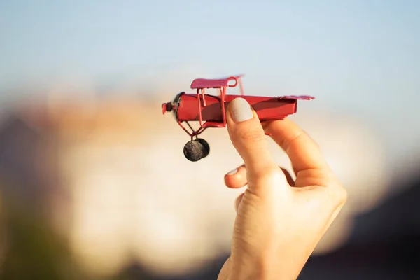 Hand Holding Red Toy Plane Holiday Concept Hands Woman Holding Stock Picture