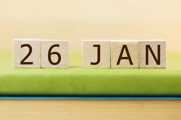 Wooden Cubes Calendar January Green Book Closeup —  Fotos de Stock