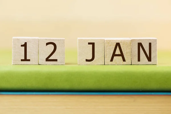 Wooden Cubes Calendar January Green Book Closeup — Stock Photo, Image