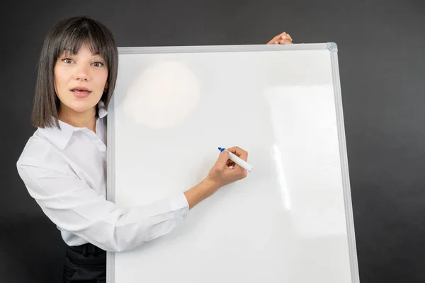Female Writing White Board Her Marker Pen Conference Meeting Office — Stock Photo, Image