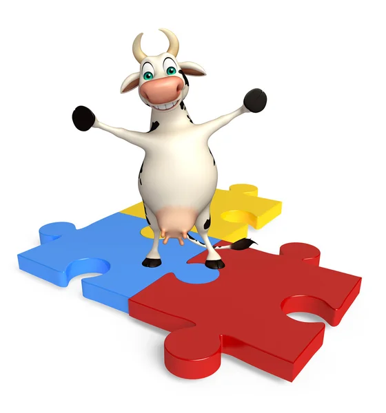 Niedliche Kuh Cartoon-Figur mit Puzzle lizenzfreie Stockfotos