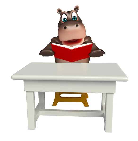 Amusant personnage de dessin animé Hippo avec table et chaise ; livre — Photo