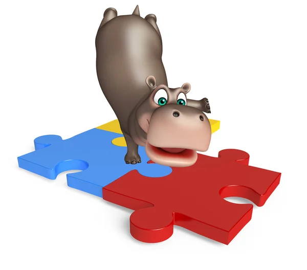 Divertente personaggio dei cartoni animati ippopotamo con puzzle — Foto Stock