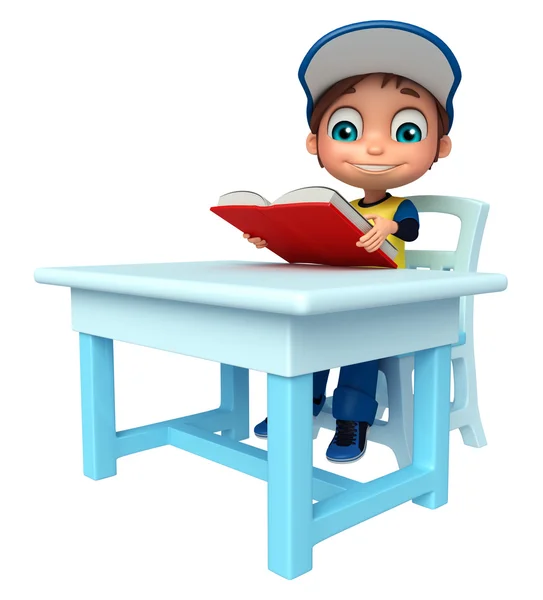 Jongen jongen met tabel stoel en boek — Stockfoto
