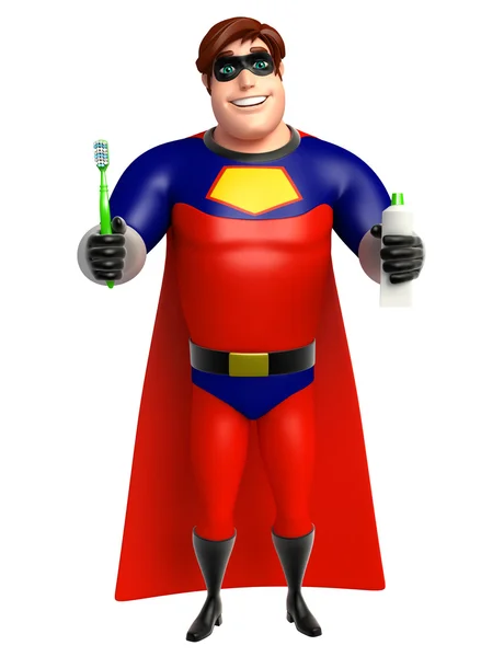 Superhéroe con cepillo de dientes y colgate —  Fotos de Stock