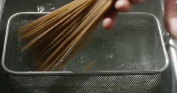 Very italian style old tradition food in extreme slow motion close up of a expert making tomato souce pasta bio — Stock video