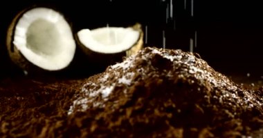 Super slow motion of coconut on cacao macro 4k (close up)