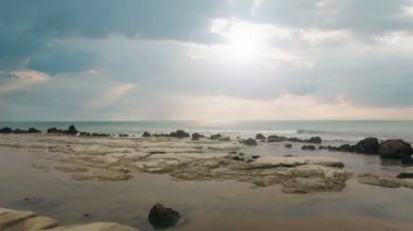 Aerial of seaside with scenic panoramic blue sky and clouds view in 4k