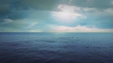 Aerial of seaside with scenic panoramic blue sky and clouds view in 4k