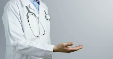 Doctor indicates technological gestures of classic neutral clean and dress charming environment and make appare a medical sign on his hand