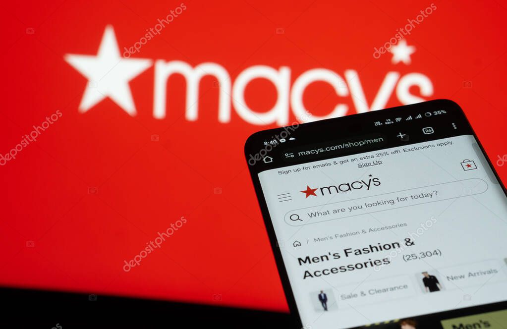 Dhaka, Bangladesh- 03 July 2025: Smartphone displaying Macy's web interface against Macy's logo background.