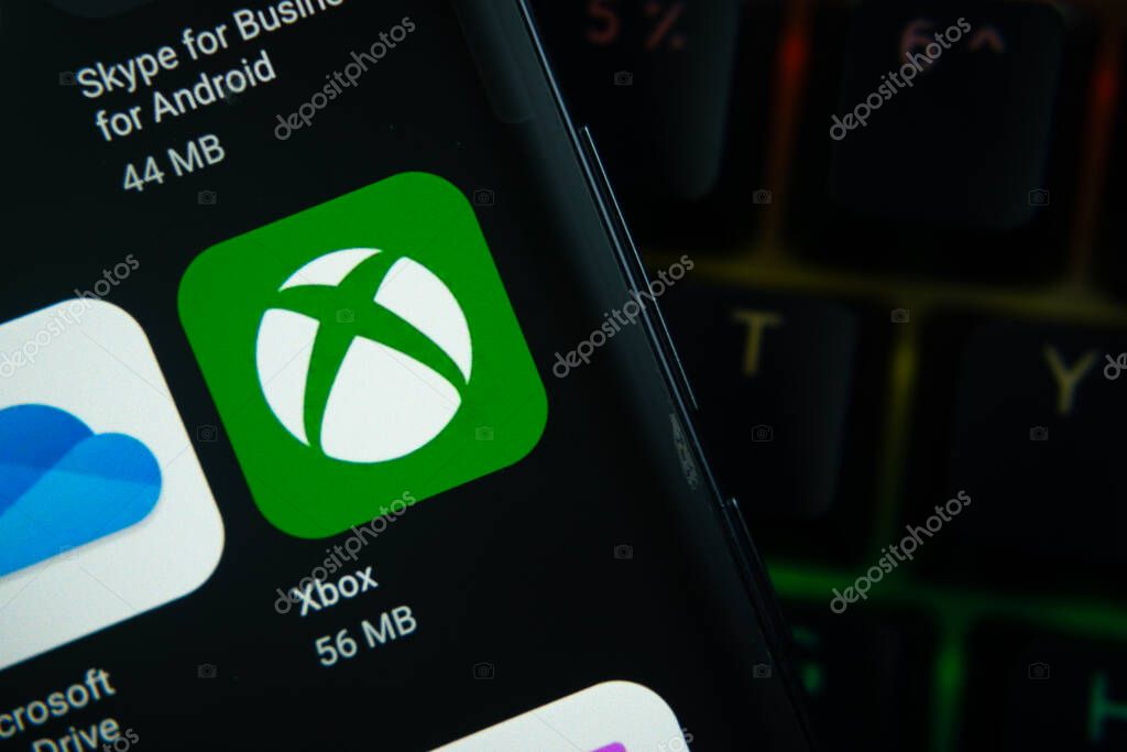 Dhaka, Bangladesh- 27 July 2025: Close-up of smartphone screen showing the Xbox app icon with a dark interface.