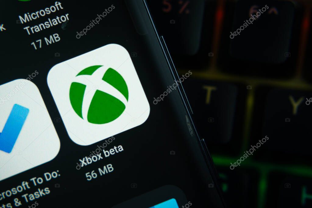 Dhaka, Bangladesh- 27 July 2025: Close-up of smartphone screen showing the Xbox beta app icon with a dark interface.