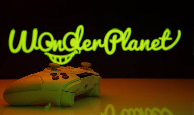 Dhaka, Bangladeş - 14 Kasım 2025: Arka planda WonderPlanet Inc ekranda görünen beyaz bir oyun alanının yakın çekimi.