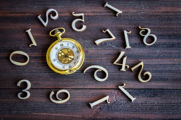 Un reloj de bolsillo con números —  Fotos de Stock