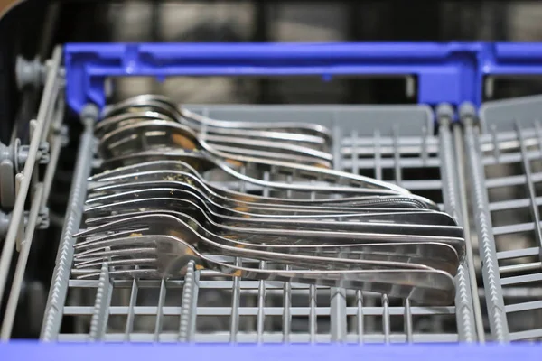 Man Loads Dirty Dishes Plates Spoons Forks Cutlery Dishwasher Tray — Stock Photo, Image