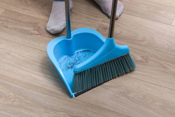 Man Sweeps Debris Blue Scoop Brush — Stock Photo, Image