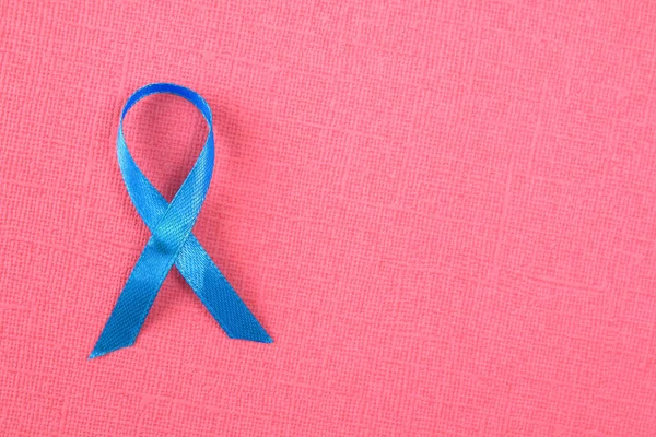 Prostate Cancer Awareness, light Blue Ribbon for supporting people living and illness. Men