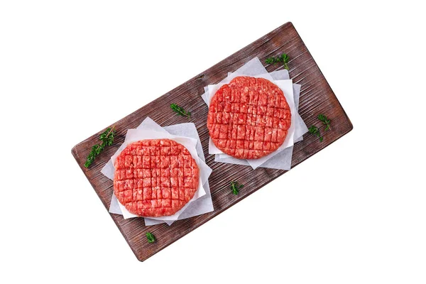 Tortini di manzo crudi macinati per hamburger. Hamburger di carne cruda. Costolette di manzo. — Foto Stock