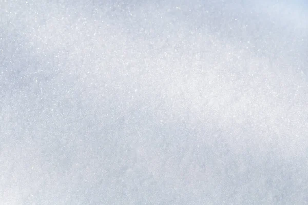 Neve invernale. Struttura della neve Vista dall'alto della neve. Design della texture. Texture bianca nevosa. Fiocchi di neve. — Foto Stock