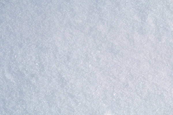 Wintersneeuw. Sneeuwtextuur Bovenaanzicht van de sneeuw. Textuur ontwerp. Sneeuwwitte textuur. Sneeuwvlokken. — Stockfoto