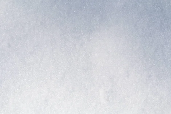 Nieve de invierno. Textura de nieve Vista superior de la nieve. Diseño de texturas. Textura blanca y nevada. Copos de nieve. — Foto de Stock