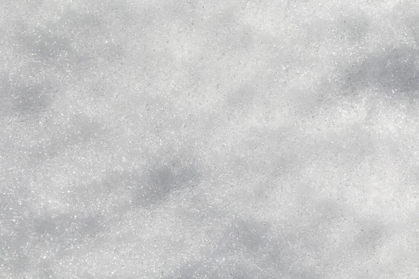 Zimní sníh. Snow texture Horní pohled na sníh. Design textury. Sněhobílá textura. Vločky. — Stock fotografie