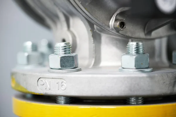 Close-up flanges connecting gas pipe systems with bolts and nuts. — Stock Photo, Image