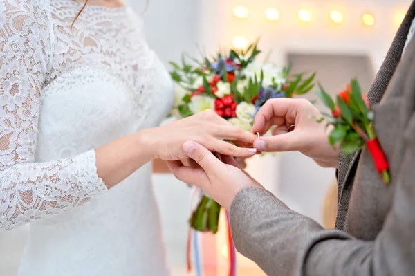 Flowers in bright hand — Stock Photo, Image