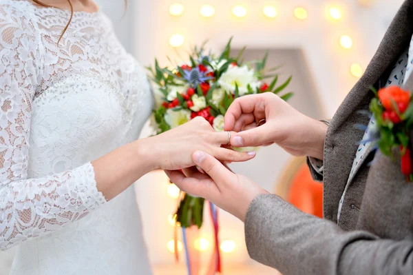 Flowers in bright hand — Stock Photo, Image