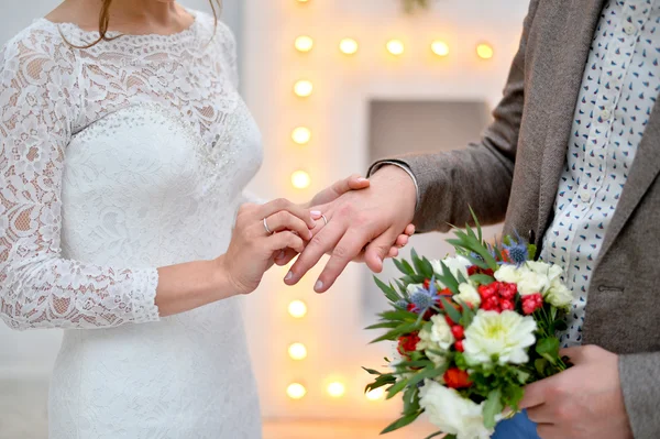 Flowers in bright hand — Stock Photo, Image