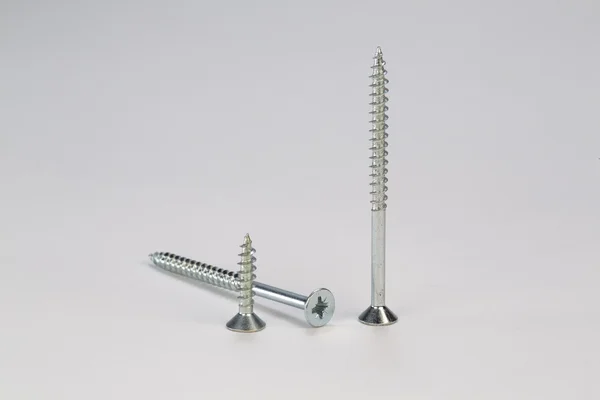 Bolts and screws on a white background — Stock Photo, Image