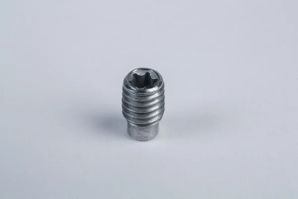 Bolts and screws on a white background — Stock Photo, Image