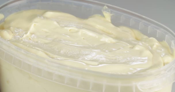 Close up shot of mango ice cream being scooped — Stock Video