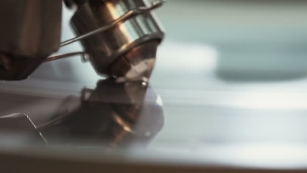 Macro shot of automatic diamond polishing machine at work — Stock Video