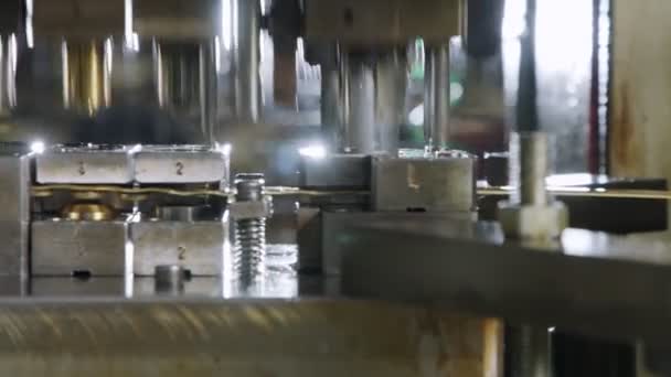 A large industrial punch press forming sheet metal parts — Stock Video