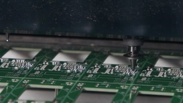 SMT machine places resistors, capacitors, transistors, LED and integrated circuits on circuit boards at high speed — Stock Video