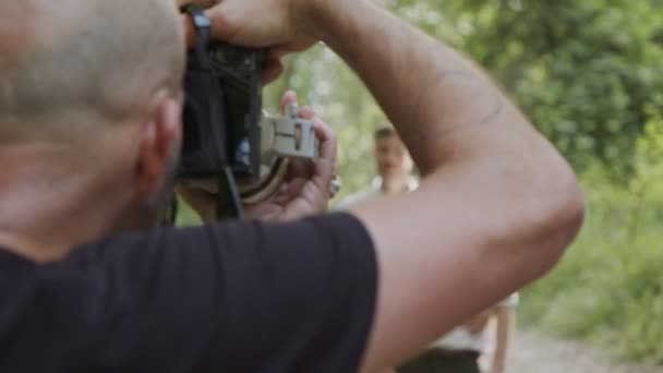 Photographer taking pictures of gay couple before their wedding — Stockvideo