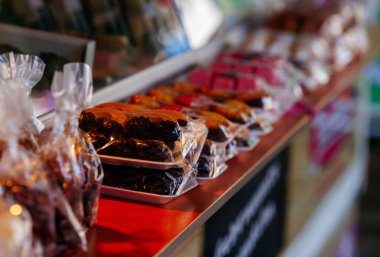St Veit An Der Glan, Austria - October 03, 2025: Assorted traditional pastries at St. Veiter Wiesenmarkt, beautifully packaged and arranged on display, creating a tempting visual feast