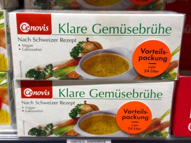 Villach, Austria - October 09, 2025: Cenovis vegetable broth boxes on store shelf, showcasing bright colors and clear text for easy visibility and consumer attraction