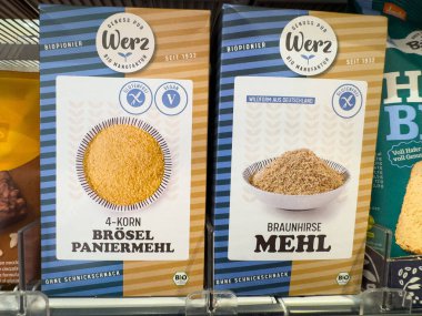 Villach, Austria - October 09, 2025: Organic Werz brand products, 4-grain breadcrumbs and brown rice flour, attractively arranged on supermarket shelf