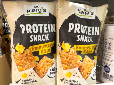 Villach, Austria - October 09, 2025: Dr. Karg's protein snack with Emmental cheese is prominently displayed on a supermarket shelf, showcasing nutritious choices