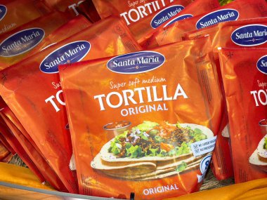 Villach, Austria - October 09, 2025: Santa Maria tortilla packages are arranged in a grocery store, featuring bright colors and enticing visuals for meal ideas