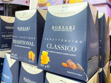 Villach, Austria - October 09, 2025: Borsari panettone boxes are beautifully arranged in a bakery, highlighting classic Italian desserts with colorful designs