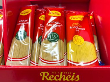 Villach, Austria - October 09, 2025: Recheis Dinkel Spaghetti and Spaghettini displayed in a bright red box, perfect for gourmet cooking and pasta lovers