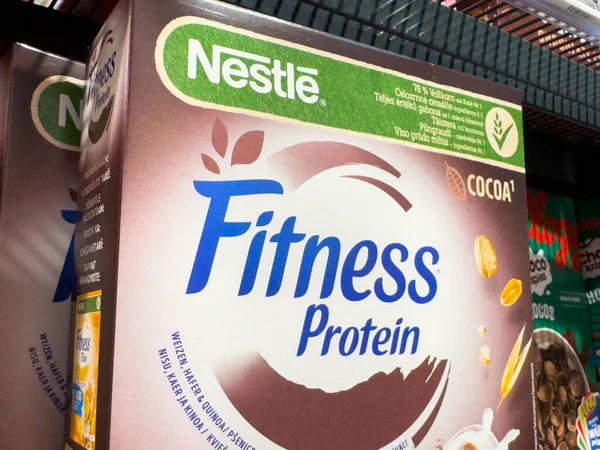 Villach, Austria - October 09, 2025: Nestle Fitness Protein cereal box is prominently displayed on a supermarket shelf, highlighting nutritious snack choices