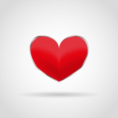 Beyaz bir arka plan üzerinde metal bir Halka'da kırmızı kalp