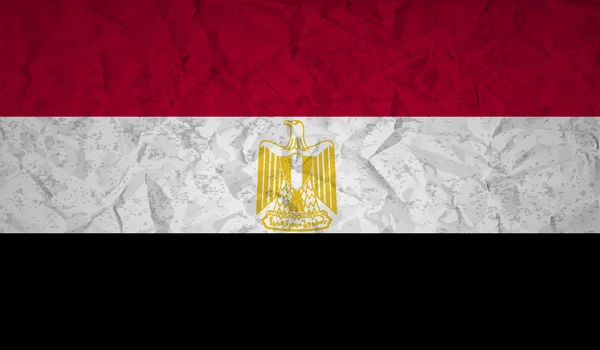 Bandiera egiziana con l'effetto di carta accartocciata e grunge — Vettoriale Stock