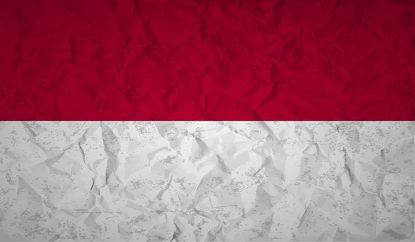 Indonesian flag with the effect of crumpled paper and grunge — Stock Vector